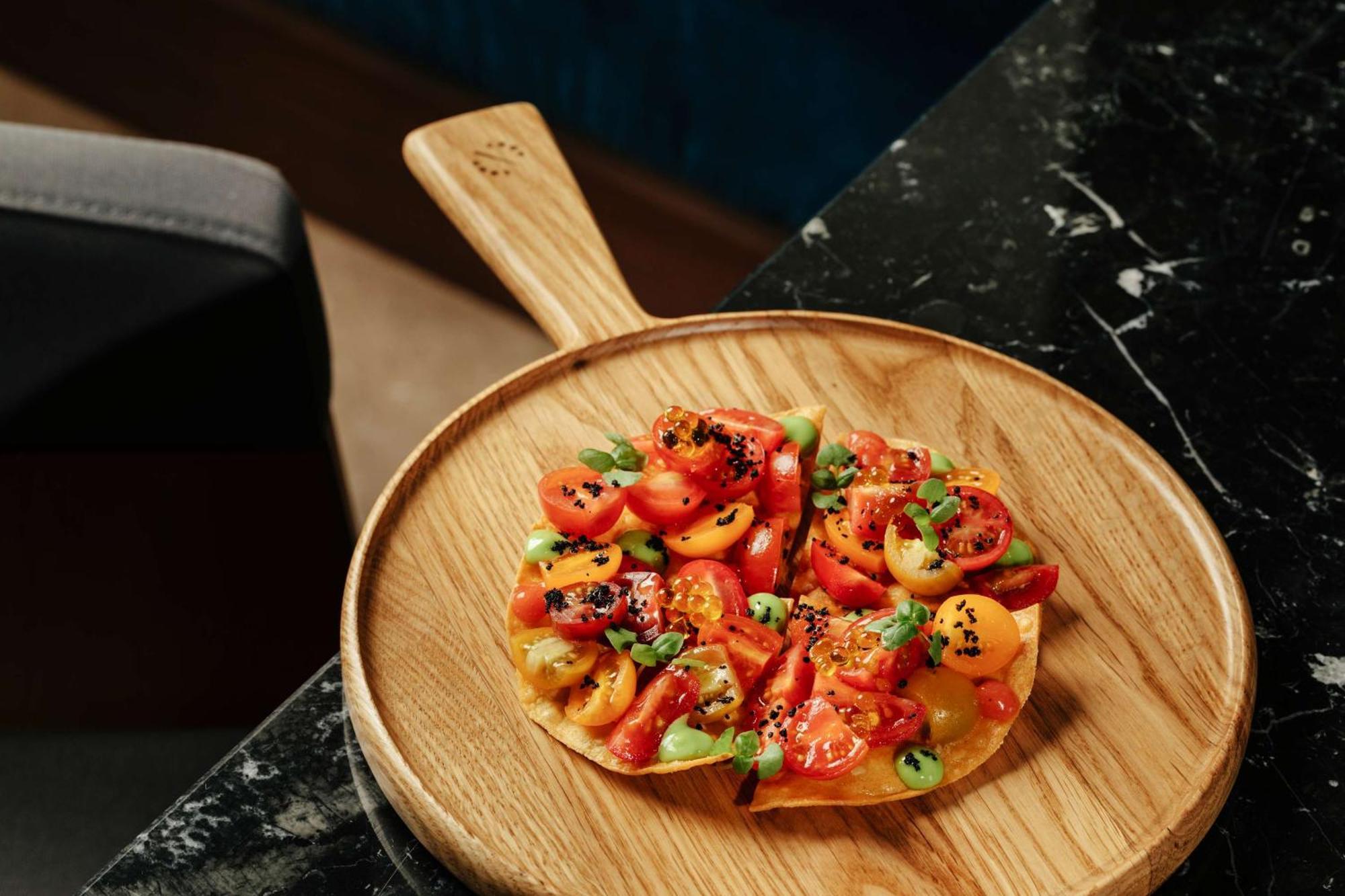 Radisson Collection Hotel, Magdalena Plaza Sevilla エクステリア 写真 A pizza at the restaurant